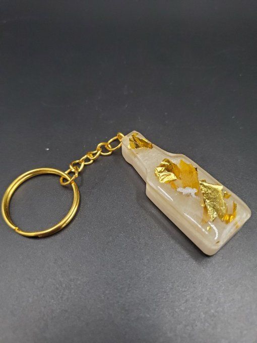Porte clef bouteille feuille d'or et blanche 